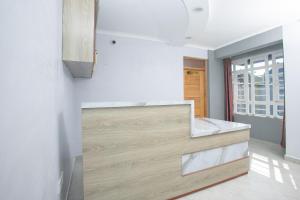 Postel nebo postele na pokoji v ubytování Hallel Guest House