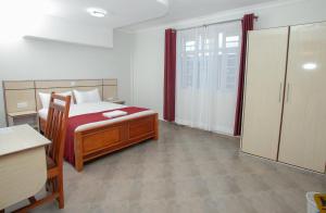 Postel nebo postele na pokoji v ubytování Hallel Guest House + 1 fotografie