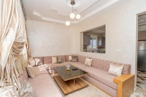 Posezení v ubytování Magnifique appartement avec jardin en face de la mer