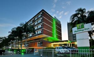 a hotel with a green light on the side of it at Holiday Inn - Mutare by IHG in Umtali