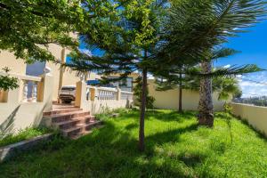 Zahrada ubytování Magnifique appartement avec jardin en face de la mer