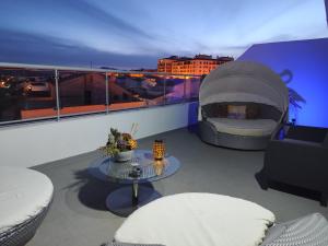 A seating area at ÁTICO RILQUE, Apartamentos Independientes con Jacuzzi Privado y Terraza en Ronda