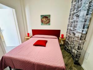 Postel nebo postele na pokoji v ubytování Dafne Marsala Centro