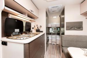 Köök või kööginurk majutusasutuses Bauer Caravan in FKK Camping Solaris