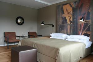 Postel nebo postele na pokoji v ubytování Strandhotel Margaretha