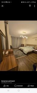 a picture of a living room with a bed at كمبوند المقصد in Kafr ash Sharā‘inah