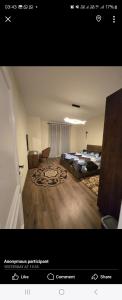 a picture of a bedroom with a bed and a rug at كمبوند المقصد in Kafr ash Sharā‘inah +16 photos