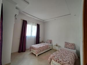 Postel nebo postele na pokoji v ubytování Superbe villa familiale avec piscine privée + 38 fotografií