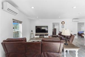 a living room with a couch and a table at Amber Nook in The Dalles