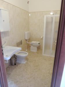 Koupelna v ubytování Albergo Ma.Re