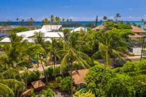 an aerial view of a resort with palm trees at Kauai Hale Melemele by Coldwell Banker Island Vacations in Kapaa