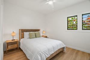 Giường trong phòng chung tại Kauai Kaha Lani 123 by Coldwell Banker Island Vacations +33 ảnh