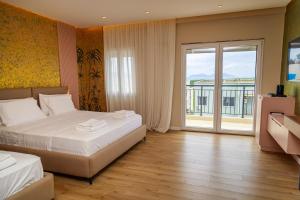 Postel nebo postele na pokoji v ubytování Solis Giselle Hotel