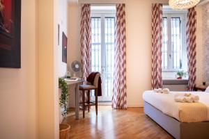 Ένα ή περισσότερα κρεβάτια σε δωμάτιο στο Duomo 500 mt - Suite between art and design with WI-FI