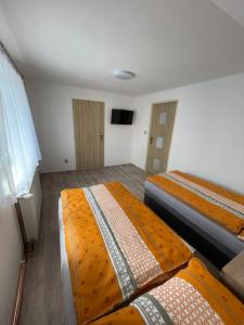 Postel nebo postele na pokoji v ubytování Apartmány Ferie
