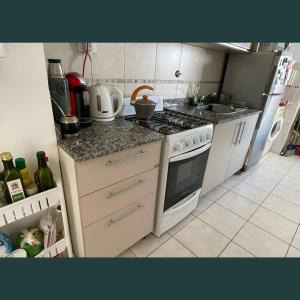 Η κουζίνα ή μικρή κουζίνα στο Departamento familiar en pleno centro. +1 φωτογραφίες