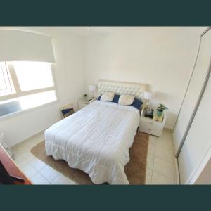 Ένα ή περισσότερα κρεβάτια σε δωμάτιο στο Departamento familiar en pleno centro.