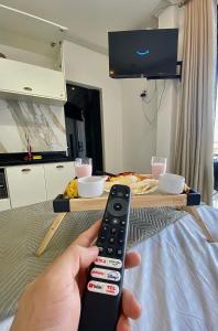 TV a/nebo společenská místnost v ubytování Acorde com Vista para o Rio no Centro de Manaus