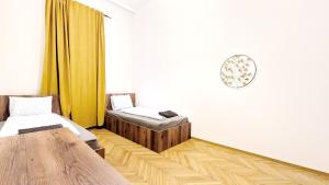 Postel nebo postele na pokoji v ubytování Spacious Rooms - 15 Min from Airport & City Center, 5 Min from Vienna Main-Bus Station EZ9