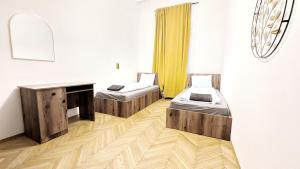 Postel nebo postele na pokoji v ubytování Spacious Rooms - 15 Min from Airport & City Center, 5 Min from Vienna Main-Bus Station EZ9