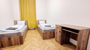 Postel nebo postele na pokoji v ubytování Spacious Rooms - 15 Min from Airport & City Center, 5 Min from Vienna Main-Bus Station EZ9