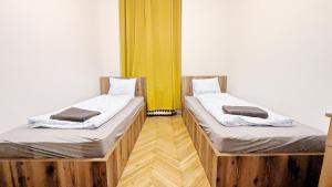 Postel nebo postele na pokoji v ubytování Spacious Rooms - 15 Min from Airport & City Center, 5 Min from Vienna Main-Bus Station EZ9