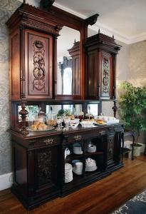 a kitchen with a buffet with food on it at The Harrison Inn in Cape May