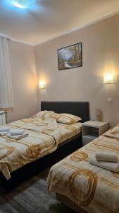 Letto o letti in una camera di Apartmani Radovanović