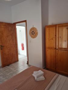 Postel nebo postele na pokoji v ubytování VILLA VRACHOS Preveza