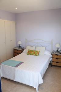 Postel nebo postele na pokoji v ubytování Apartamento Calypso