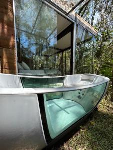 a boat is sitting outside of a house at Casa Aquário in Petrópolis