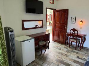 Kuchyň nebo kuchyňský kout v ubytování Hotel Las Flores