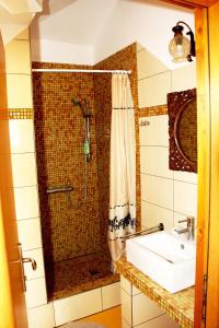 a bathroom with a shower and a sink at Seaside holiday house Jadrija, Sibenik - 24454 in Jadrija