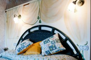 A bed or beds in a room at Casa Graziella al Borgo