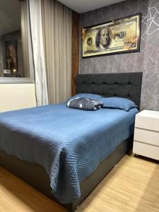 Ένα ή περισσότερα κρεβάτια σε δωμάτιο στο Flat Privativo Hotel GO INN +16 φωτογραφίες