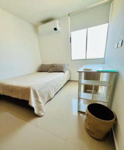 Ένα ή περισσότερα κρεβάτια σε δωμάτιο στο Apartamento en Sabanilla