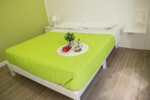 A bed or beds in a room at Baia Del Sole