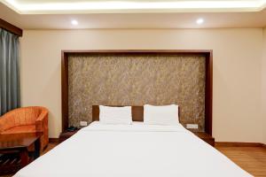 Postel nebo postele na pokoji v ubytování Hotel Tark Plaza Near IGI Airport Delhi