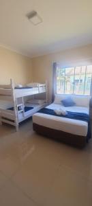 Postel nebo postele na pokoji v ubytování Casa com piscina aquecida, a 20 min do Beto Carrero