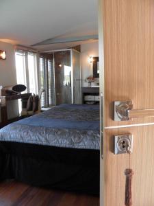 Ένα ή περισσότερα κρεβάτια σε δωμάτιο στο Dolce Riva Giverny - Paris Luxury Boat