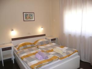 Postel nebo postele na pokoji v ubytování Guesthouse Mira