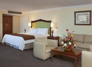 Postelja oz. postelje v sobi nastanitve Hotel Francia Aguascalientes