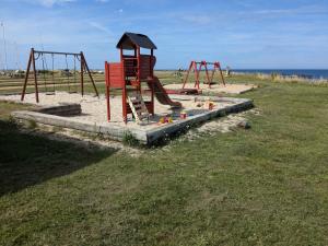 Herní místnost nebo prostor pro děti v ubytování Lovely 2-Story Cabin By The Sea On Bornholm,