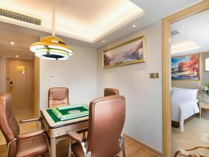 Fotografie z fotogalerie ubytování Vienna Hotel Hunan Ningyuan Jiuyi v destinaci Guanqiao