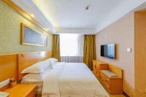 Μια τηλεόραση ή/και κέντρο ψυχαγωγίας στο Vienna Hotel Urumqi Railway Administration Academy of Sciences