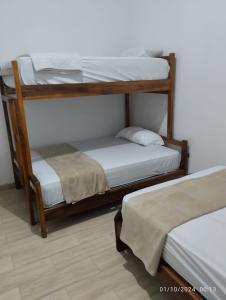 Ein Bett oder Betten in einem Zimmer der Unterkunft Quinta Vacacional Oasis en Pedro Vicente Maldonado-Pichincha Ecuador + 66 Fotos