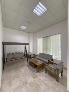 أجنحة هومينج ــ Homing Suites的休息区