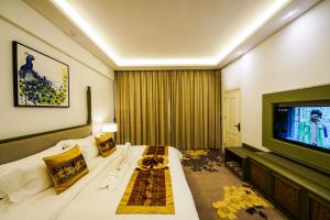 Μια τηλεόραση ή/και κέντρο ψυχαγωγίας στο JING LAND HOTEL