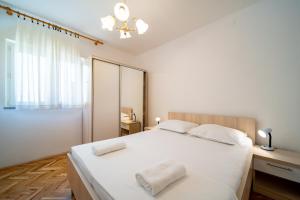 Apartmani Rajka Paparić客房内的一张或多张床位