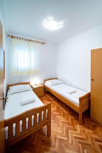 Apartmani Rajka Paparić客房内的一张或多张床位
